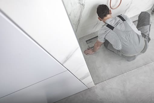 Shower Drain Repair Clogged shower drain being repaired