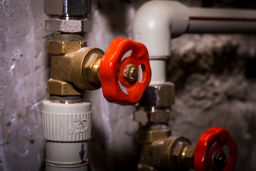 Valve Replacement Plumber replacing a water valve